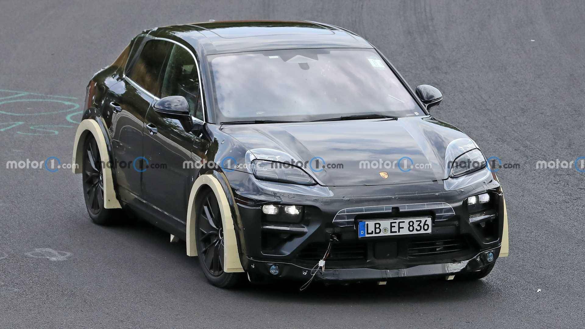 Porsche Cayenne EV "Porsche Macan EV Spied Testing At Nurburgring With Strange Aero Bits" - Link 1663339369281