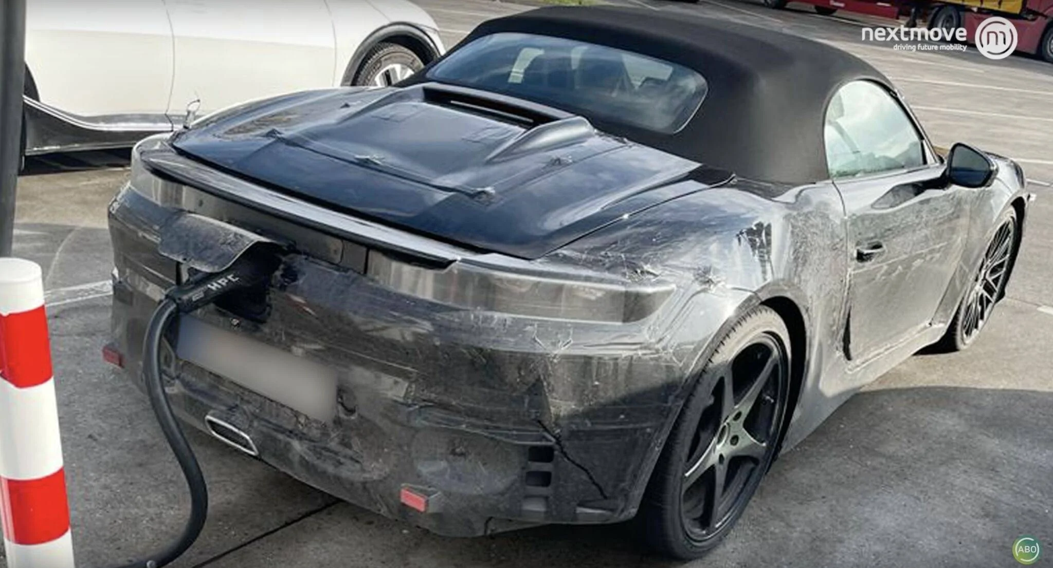 Porsche Cayenne EV Porsche 718 Boxster convertible EV spotted charging at 170kw rate 3F8D4E78-4B03-45B2-81EE-B03F04920945