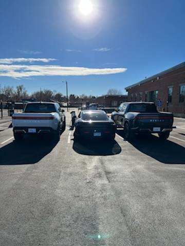 Porsche Cayenne EV Way off topic:   when my Taycan met Rivian IMG_1750.HEIC