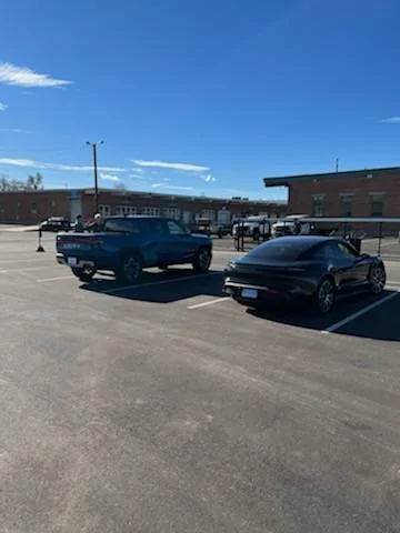 Porsche Cayenne EV Way off topic:   when my Taycan met Rivian IMG_1759.HEIC